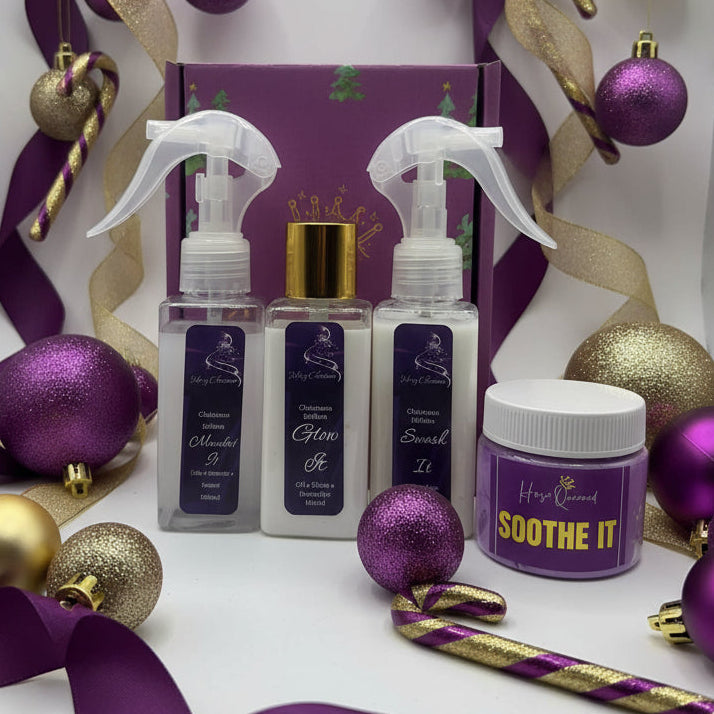 Purple and gold Horse Queened Glow Ho Ho Pack gift box containing three mini spray bottles – Glow It, Swash It , Manifest It and Soothe It Candy Cane Edition – surrounded by Christmas ribbon and fairy lights.