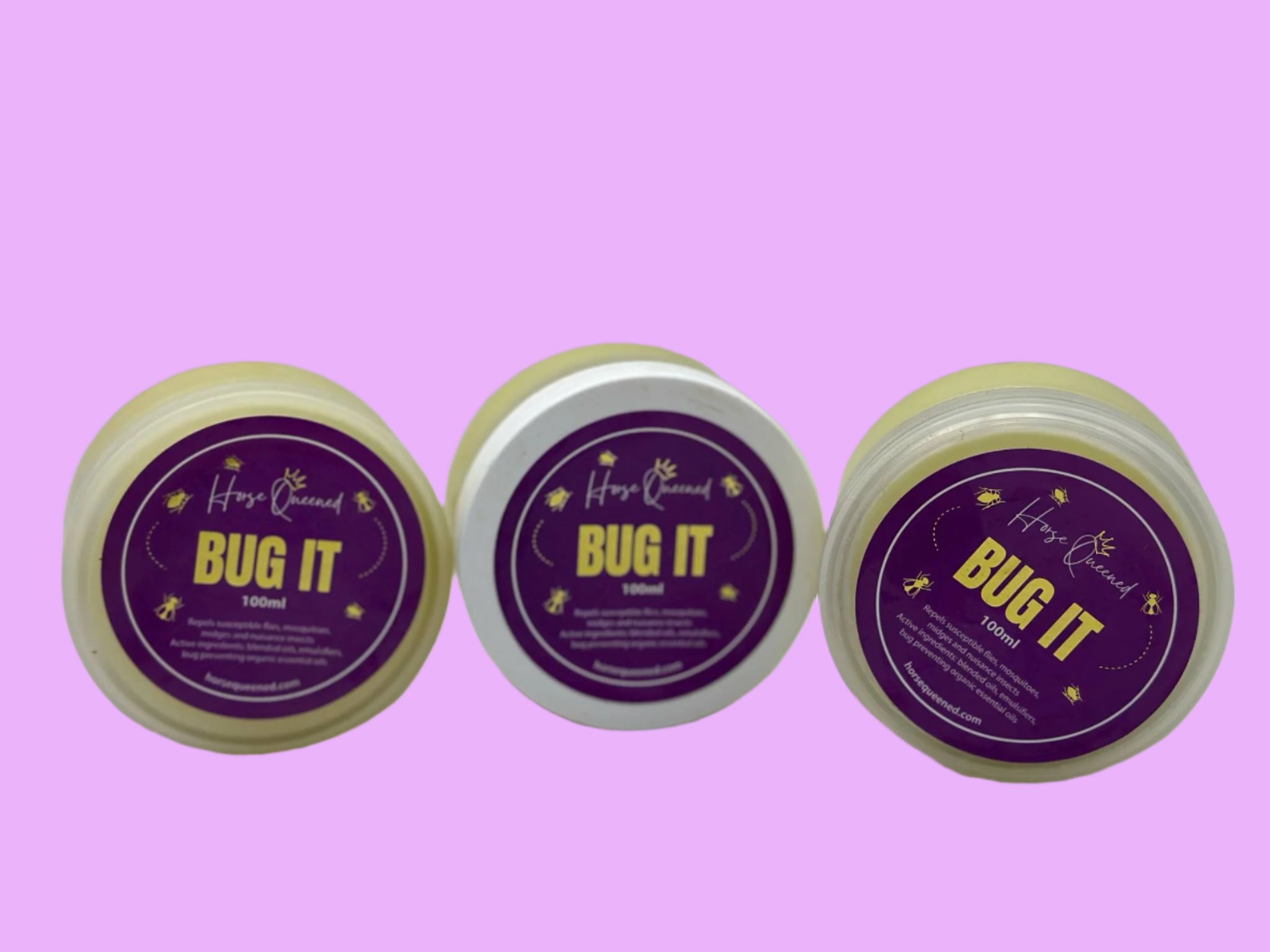 Three containers of 'BUG IT' with purple labels on a white background