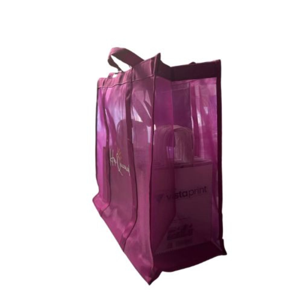 Pink transparent tote bag with visible branding on a white background