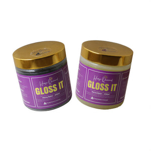 Two jars of 'Gloss It' horse balm with gold lids on a white background